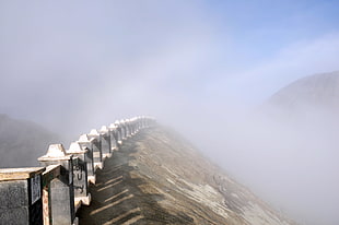 photo of concrete fence beside rocky mountain, tengger, semeru HD wallpaper