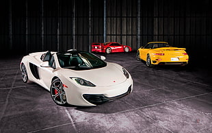 red , white and yellow luxury coupes HD wallpaper