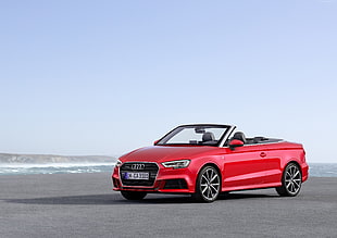 red Audi convertible coupe during daytime HD wallpaper