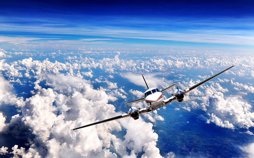 white airplane above the blue sky during daytime HD wallpaper