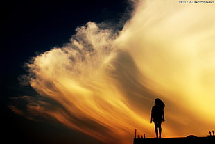 silhouette of woman during golden time HD wallpaper