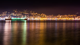 photo of ship in body of water beside city during nighttime, Ajaccio, sea, night, lighter HD wallpaper