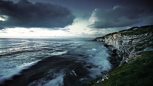 ocean water under cloudy sky, sea, clouds, coast, cliff