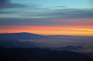 landscape photo of mountain near beach during golden hour, mexico