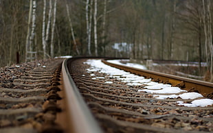 depth of field photography of brown rail