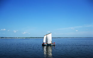 white sailboat on the middle of the ocean during daytime HD wallpaper
