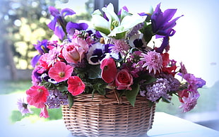 flowers on brown woven basket HD wallpaper