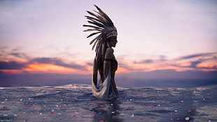 woman wearing brown and black headdress and black top on body of water at daytime HD wallpaper