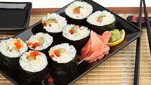 sushi on black ceramic plate HD wallpaper