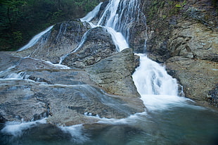 falls with brown stone close up photo