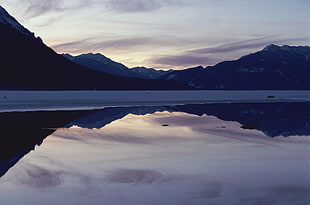 lake with mountains at daylight photography