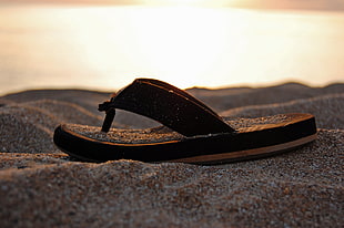 unpaired brown flip flops HD wallpaper