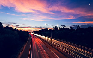 timelapse photo of road during nightime HD wallpaper