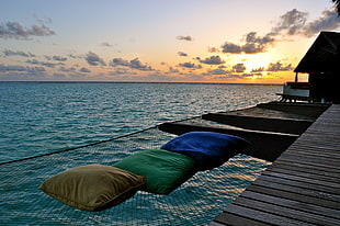 black dock net with three pillows HD wallpaper