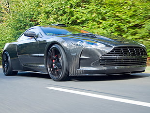 black Aston Martin coupe HD wallpaper