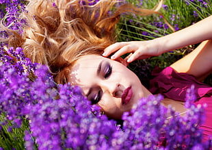 woman lying on Lavender flower field HD wallpaper
