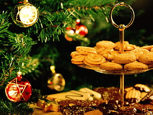 pile of cookie served on gold-colored cookie rack HD wallpaper