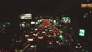 cars stuck on traffic at night time HD wallpaper