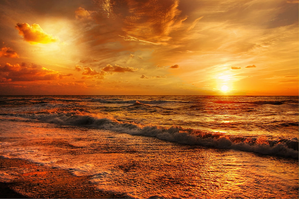 time laps photo of a sea under skies during sunset HD wallpaper