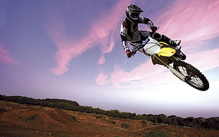 yellow, white, and black motocross dirt bike, Suzuki, jumping, motorsports, motocross HD wallpaper