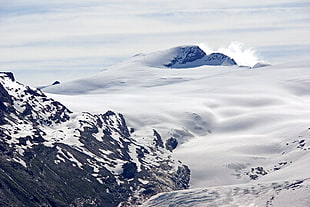 black mountain covered with snow during daytime, switzerland