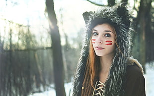 woman wearing black and white snow hoodie