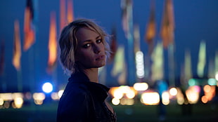 woman wearing black top standing