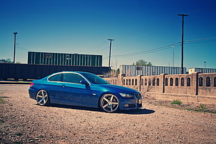 blue BMW sedan