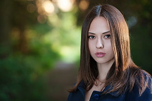 woman wearing blue collared top