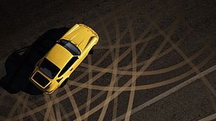 yellow coupe on concrete road HD wallpaper