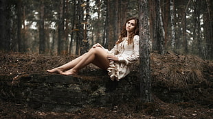 photography of woman resting in forest HD wallpaper