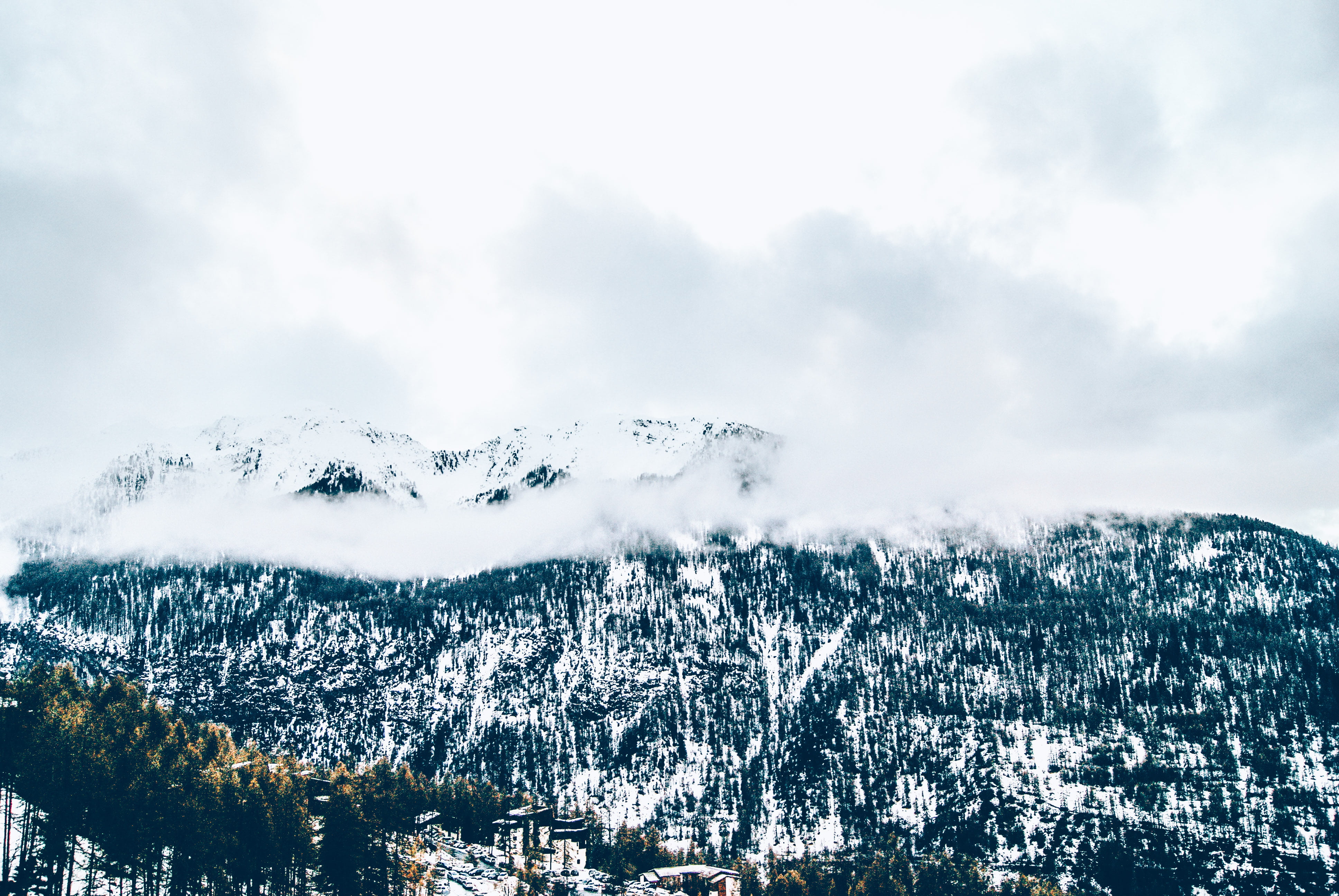 black and white snow covered mountain