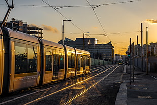 silver train during sunset HD wallpaper