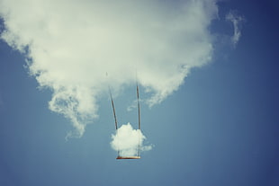 black swing and smoke, clouds