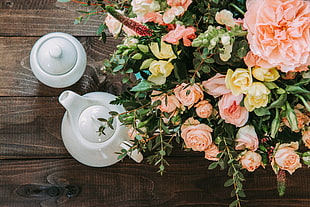 white ceramic tea pot and jar