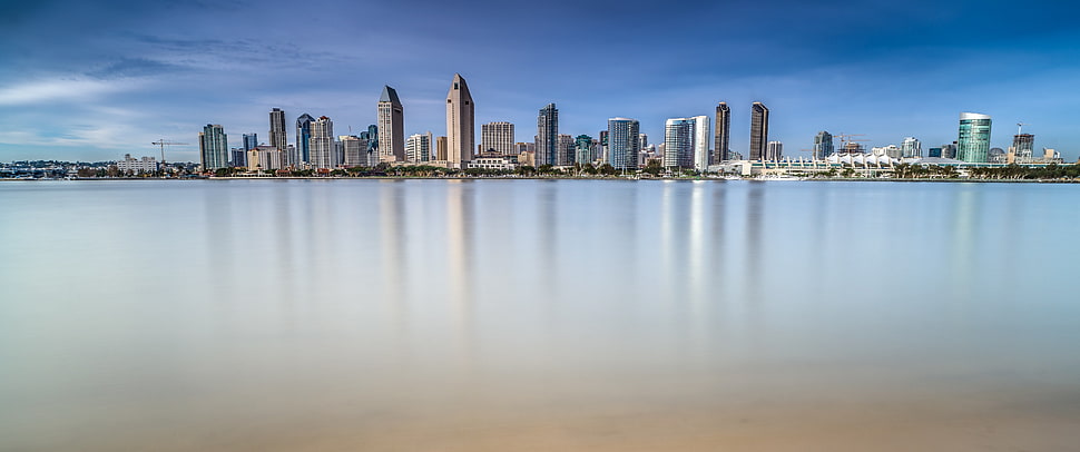 high-rise buildings and sea, water, reflection, city, skyscraper HD wallpaper
