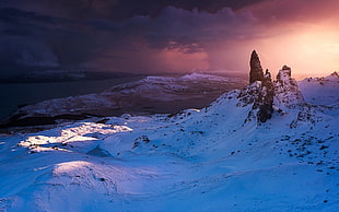 snow on mountain photo during sunset