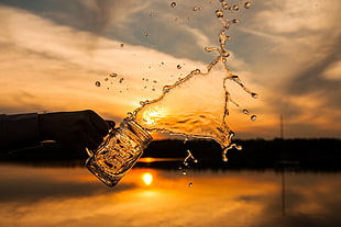 water drops silhouette mountain under sunset