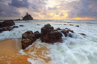 View of Sea Against Cloudy Sky during Sunset