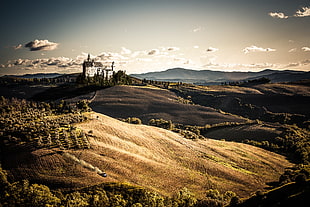 photography of hills during day time