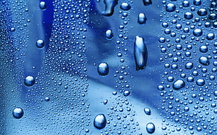 Water drops on glass panel HD wallpaper
