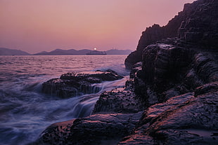 cliff near body of water