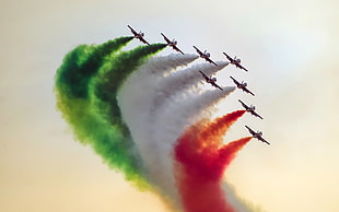 photography of jet doing air show spraying green, white, and red smoke represents Italy HD wallpaper
