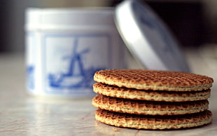 selective-focus photography stack of cookies HD wallpaper