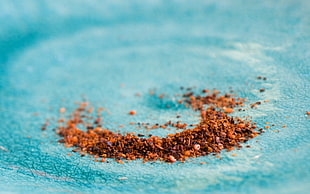 brown ingredients powder on blue surface HD wallpaper