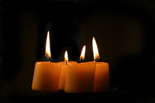 photo of four lighted candles HD wallpaper