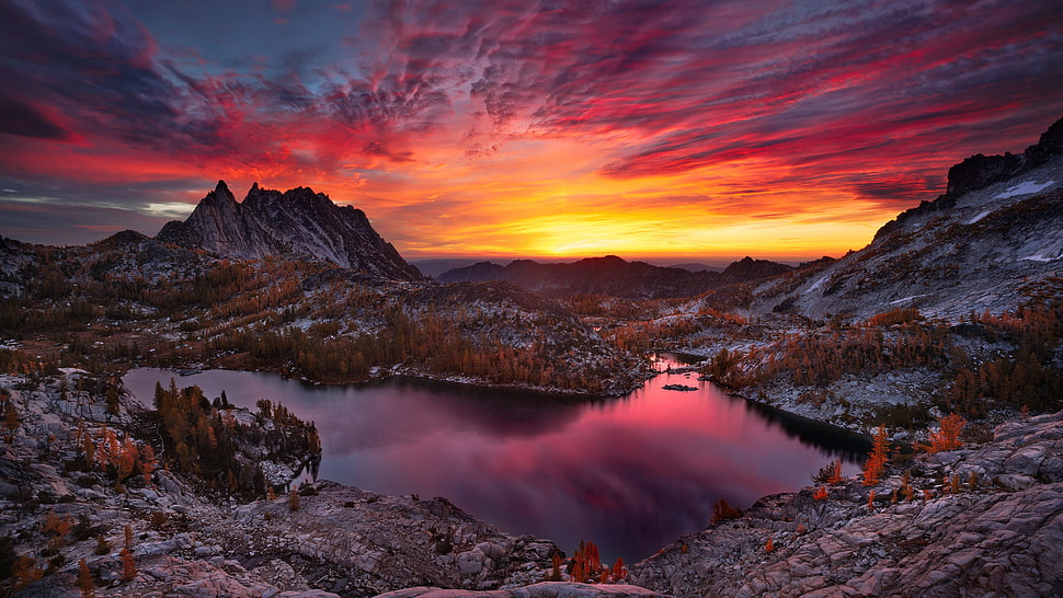 gray mountain near lake during dawn HD wallpaper