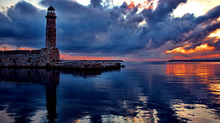 brown lighthouse, water, lighthouse, sky, sea