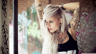 woman in black tank top with tattoo posing HD wallpaper