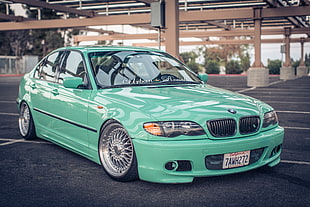 green BMW sedan HD wallpaper